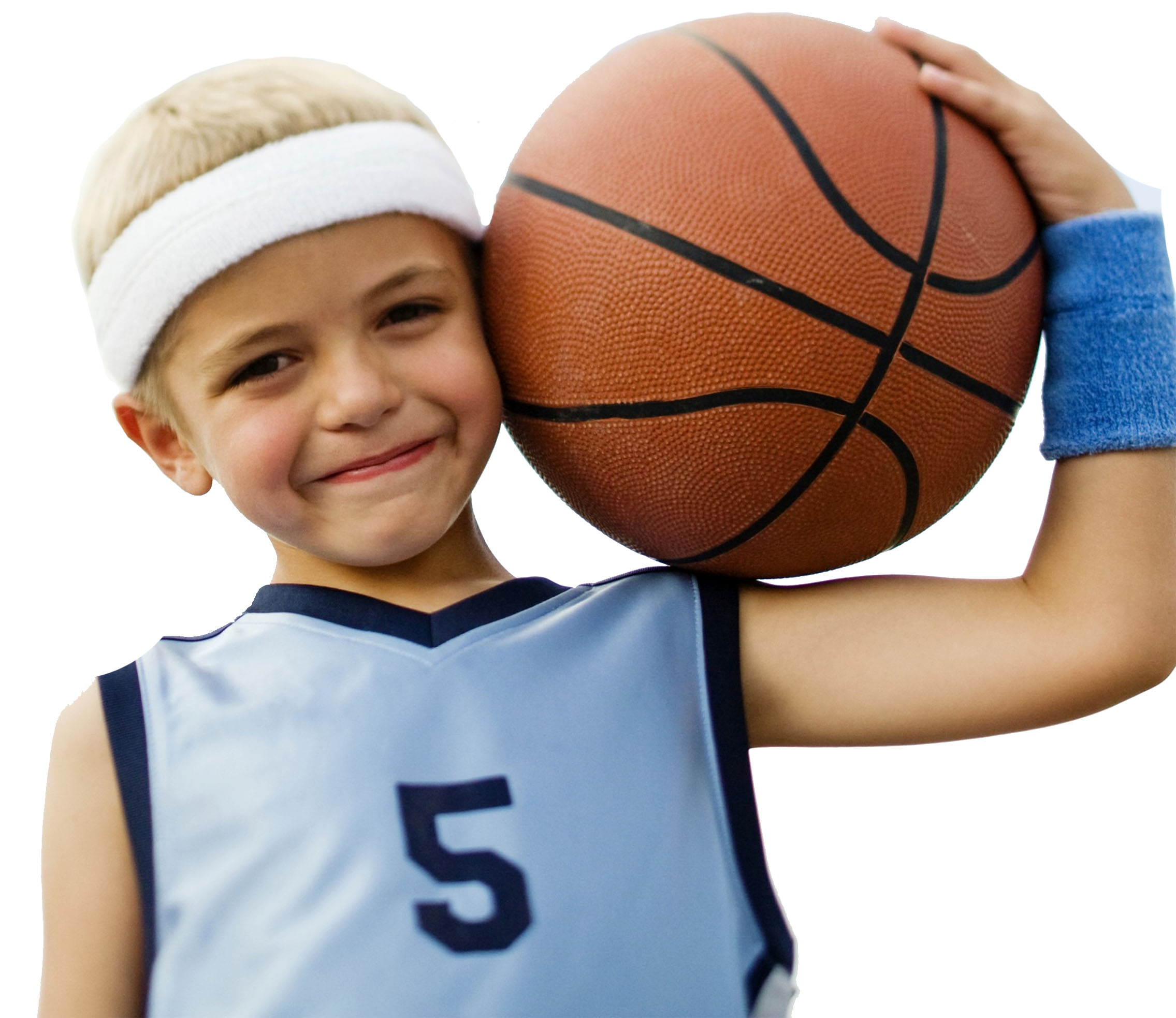 A kid wearing a number 5 jersey while holding a ball